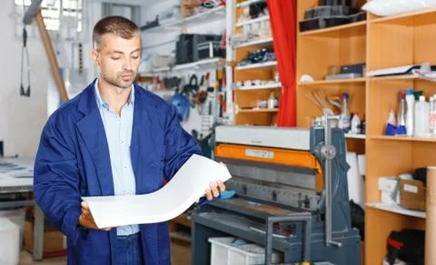 Portrait of a working man at printer studio Stock Photos