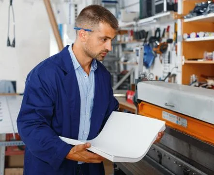 Portrait of a working man at printer studio Foto stock
