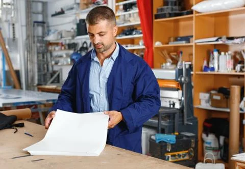 Portrait of a working man at printer studio Stock Photos