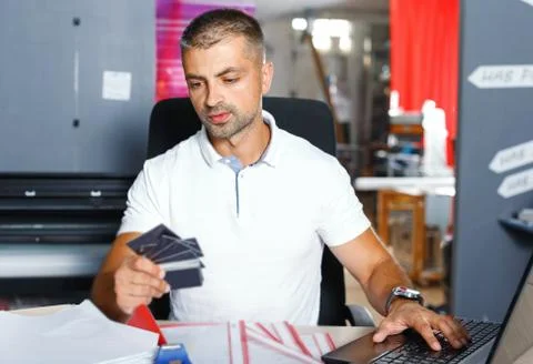 Portrait of a working man at printer studio Stock Photos