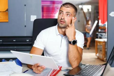 Portrait of a working man at printer studio Stock Photos