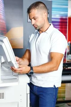 Portrait of a working man at printer studio Stock Photos