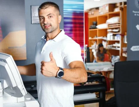 Portrait of a working man at printer studio Stock Photos