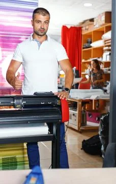 Portrait of a working man at printer studio Stock Photos