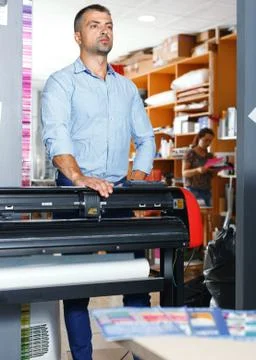 Portrait of a working man at printer studio Stock Photos