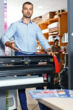 Portrait of a working man at printer studio Stock Photos