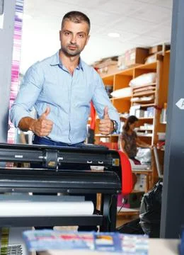 Portrait of a working man at printer studio Stock Photos