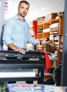 Portrait of a working man at printer studio Stock Photos