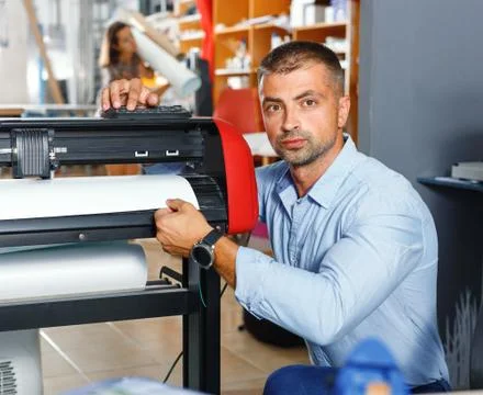 Portrait of a working man at printer studio Stock Photos
