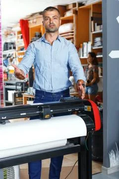 Portrait of a working man at printer studio Foto stock