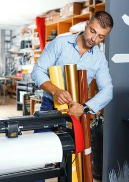 Portrait of a working man at printer studio Stock Photos