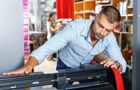Portrait of a working man at printer studio Stock Photos