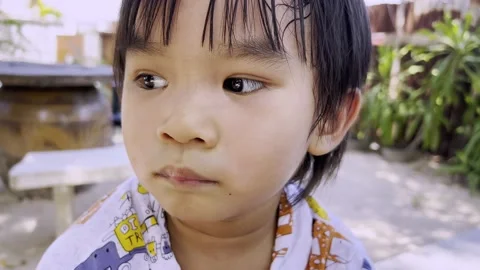 Portrait of worry and scare face of kid 스톡 동영상 196103804