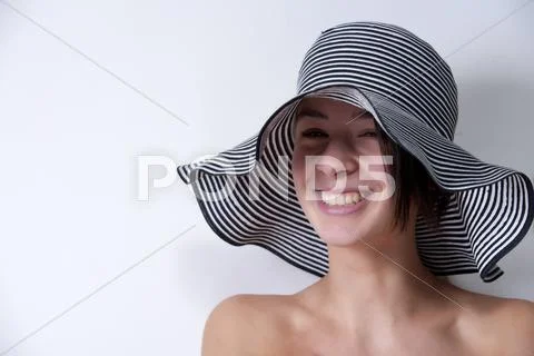 Portrait of you multi etnic girl with summer hat Stock Photos