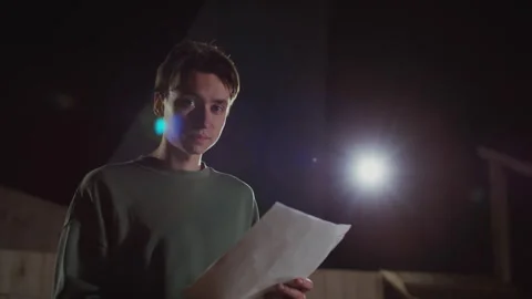 Portrait of Young Actor with Script on Theatre Stage Stock Footage 279591386
