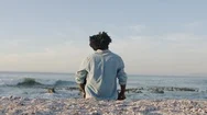 Portrait Of Young African American Man Tourist Sitting On Beautiful Peaceful Stock Footage