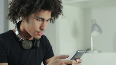 Portrait of the young Afro-American which thumbs through a news line Stock Footage 58587120