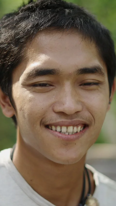 Portrait of young asian construction worker smiling to the camera - FHD Vertical Stock Footage 265489298