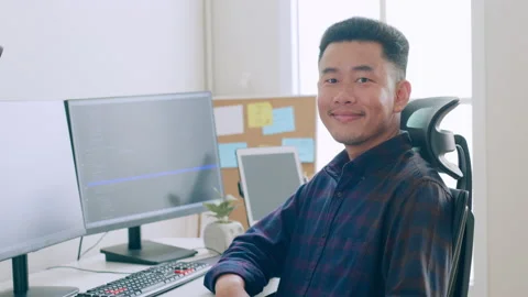 Portrait young Asian man developer programmer, software engineer, IT support Stock Footage 221085284