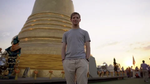 Portrait of Young Backpacker At Thai Temple Stock Footage 122148200