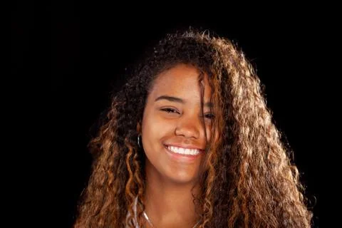 Portrait of young beautiful lady posing for  the camera on isolated backgroun Stock Photos
