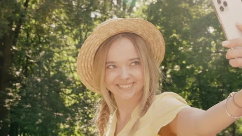 Portrait of young beautiful smiling hipster girl in trendy summer sundress Stock Footage 142425360