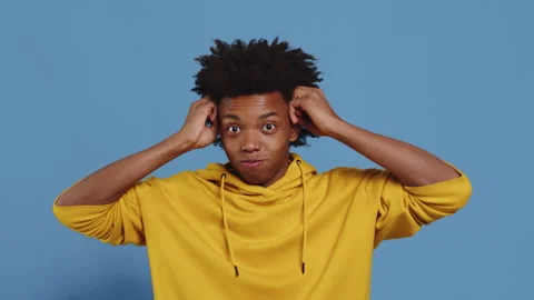 Portrait of a young black guy feeling extremely worried and shocked, touching Stock Footage 270418467