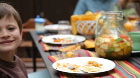 Portrait of young boy eating Stock-Footage 61670478