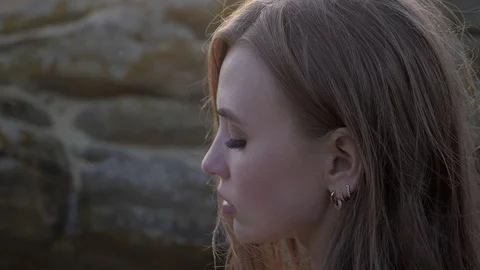 A portrait of a young bride in the sunset Stock Footage 129073020