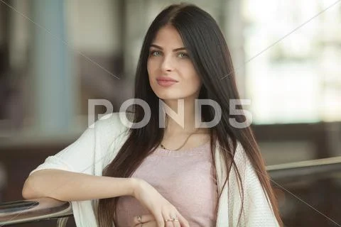 Portrait of a young brunette woman Stock Photos