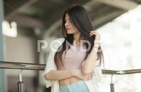 Portrait of a young brunette woman Stock Photos