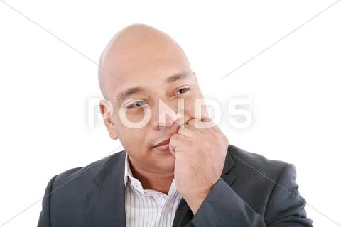 Portrait of a young business man looking away and thinking Stock Photos
