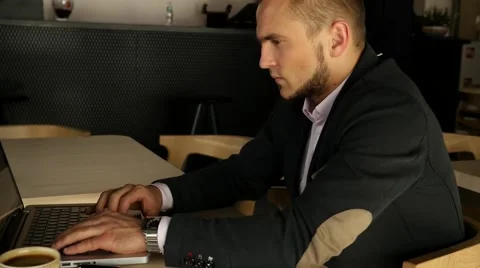 Portrait of a young businessman using mobile phone outside the office. Close up Stock Footage 55653462