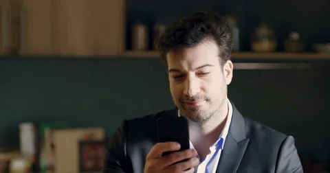 Portrait of a young businessman using smart phone Stock Footage 74407980