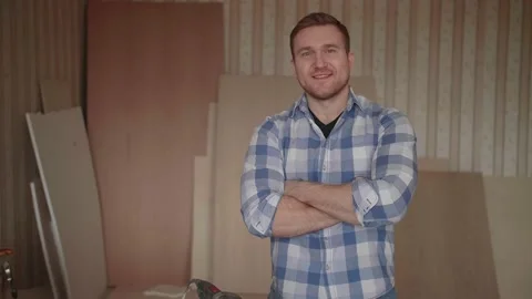 Portrait of a young carpenter behind the workplace Stock-Footage 153493449