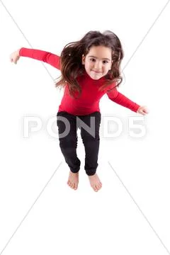 Portrait of young caucasian little girl jumping Stock Photos