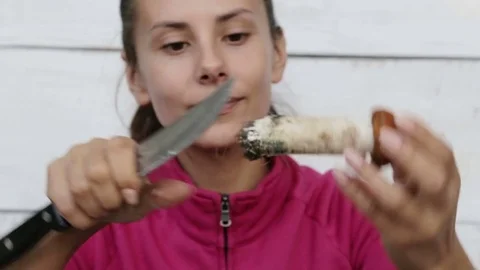 Portrait of a young chef girl preparing mushrooms. Stock Footage 80463519