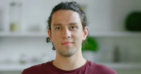 Portrait of young confident man, blurred background Stock-Footage 113650331