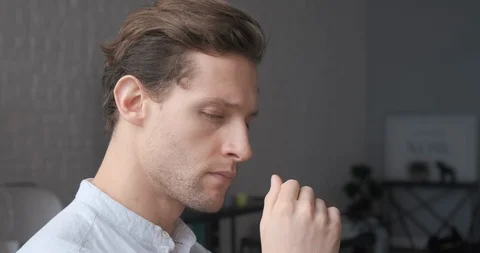 Portrait of young confident man looking at camera serious. Handsome milennial Stock Footage 123457331
