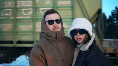 Portrait of a young couple on the background of which Stockbeeldmateriaal 150331382