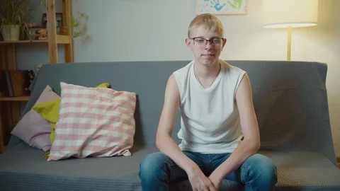 Portrait Young Cute Guy Queer With Glasses Video stock 125704602