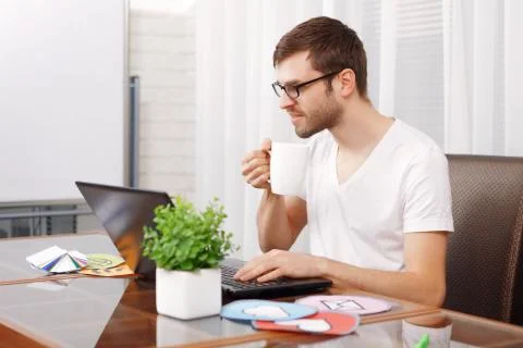 Portrait of a young developer working 写真素材