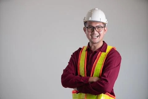 Portrait of young engineering smiling on the white background Stock Photos