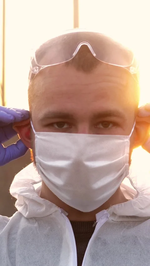 Portrait of young epidemiologist preparing to save people. Protecting patients Stock Footage 305205896