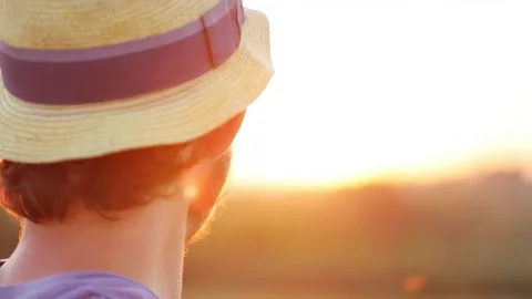 Portrait of young farmer in hat at sunset Stock Footage 77559300