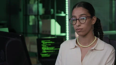 Portrait of Young Female Programmer at Computer Desk in Night Office Stock Footage 292625185