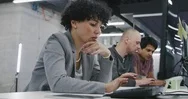 Portrait Of Young Female Software Developer At Busy Startup Office With Multi Stock Footage