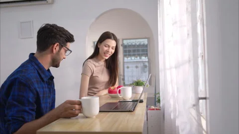 Portrait of a young freelancer smiling while working online via laptop Video stock 309018524