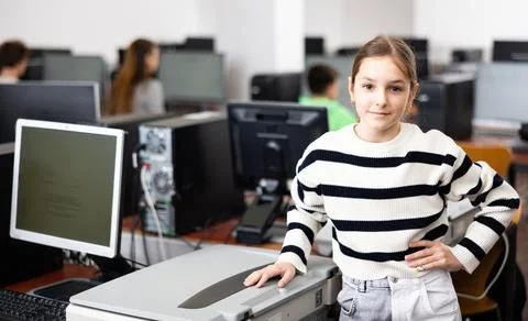 Portrait of young girl in computer class Stock Photos