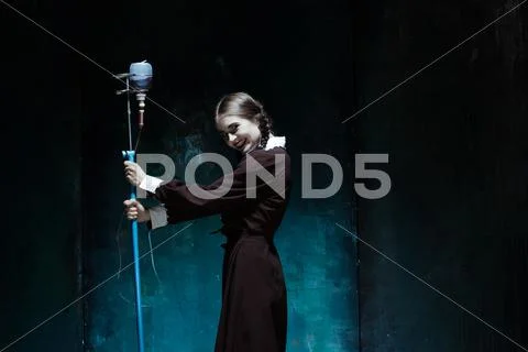 Portrait of a young girl in school uniform as a vampire woman Stock Photos
